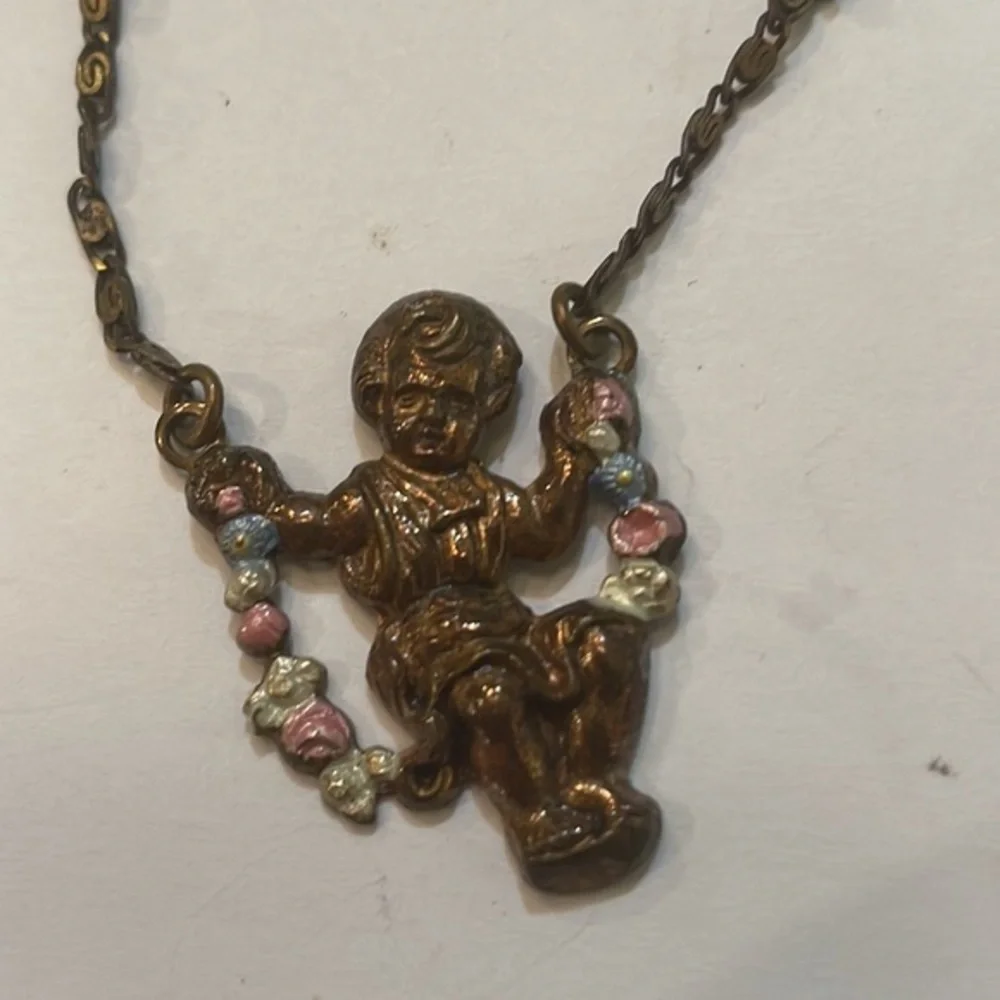 RARE 1920s VINTAGE MIXED METALS CHERUB ANGEL SWINGING ON SWING BROOCH‎